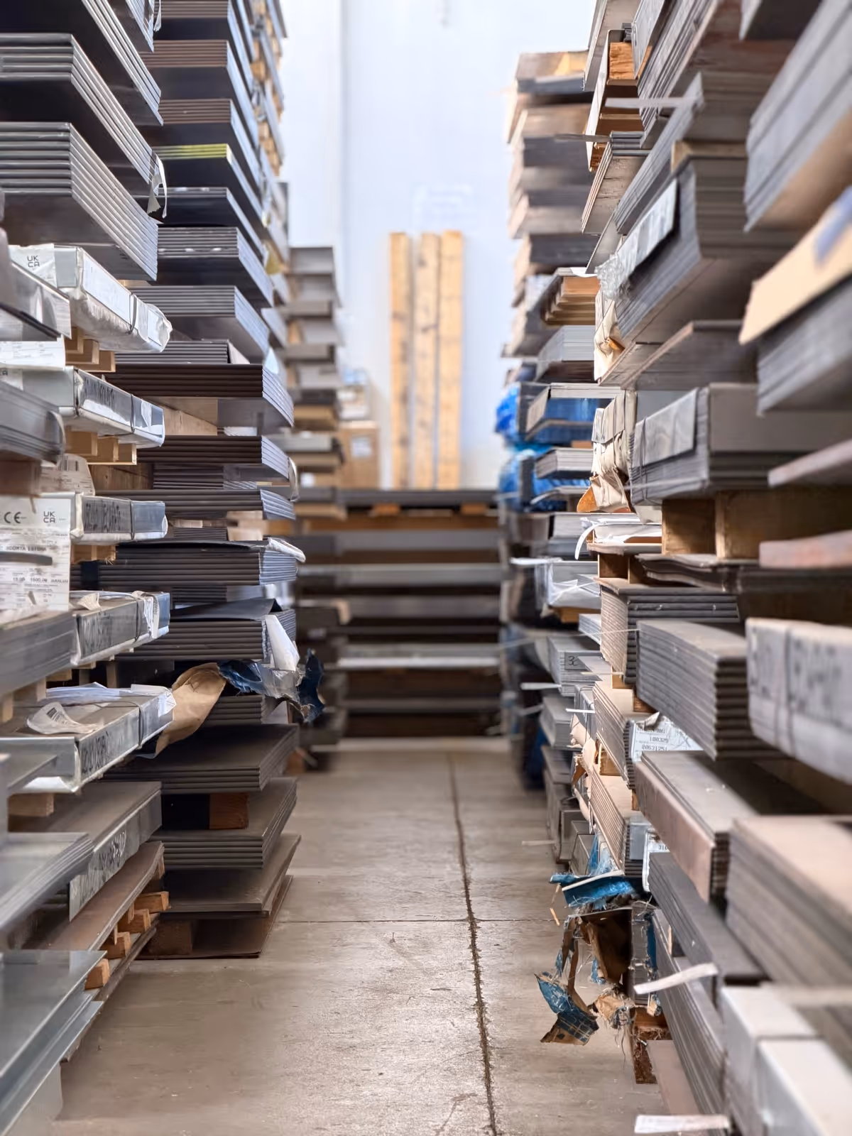 Sheet warehouse — aisle with assorted stacks